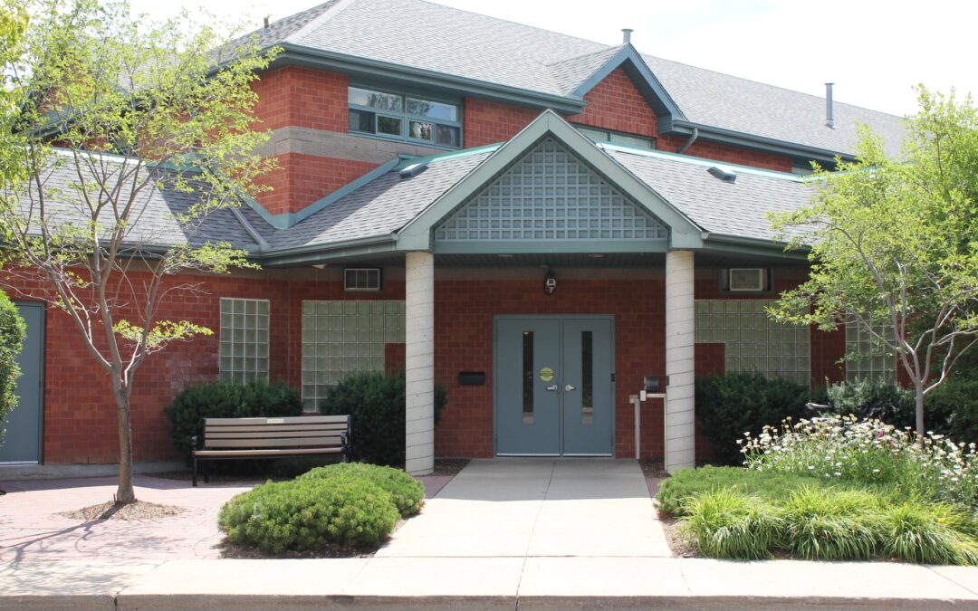 Photo of front of Family Transition Place Orangeville office in spring