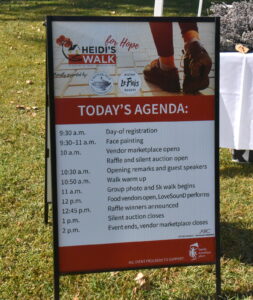 Heidi's Walk for Hope September 2023 Today's Agenda sign outlining what events are taking place at what time.