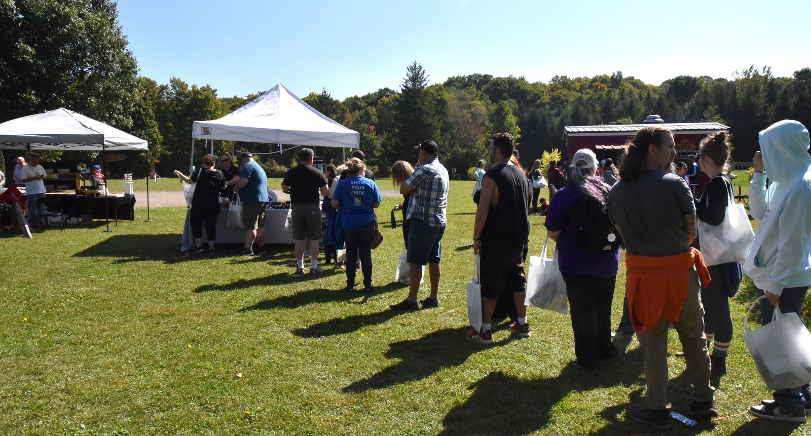 Participants lined up to get their yummy treats from Lavender Blue Catering table at Heidi's Walk for Hope September 2023.