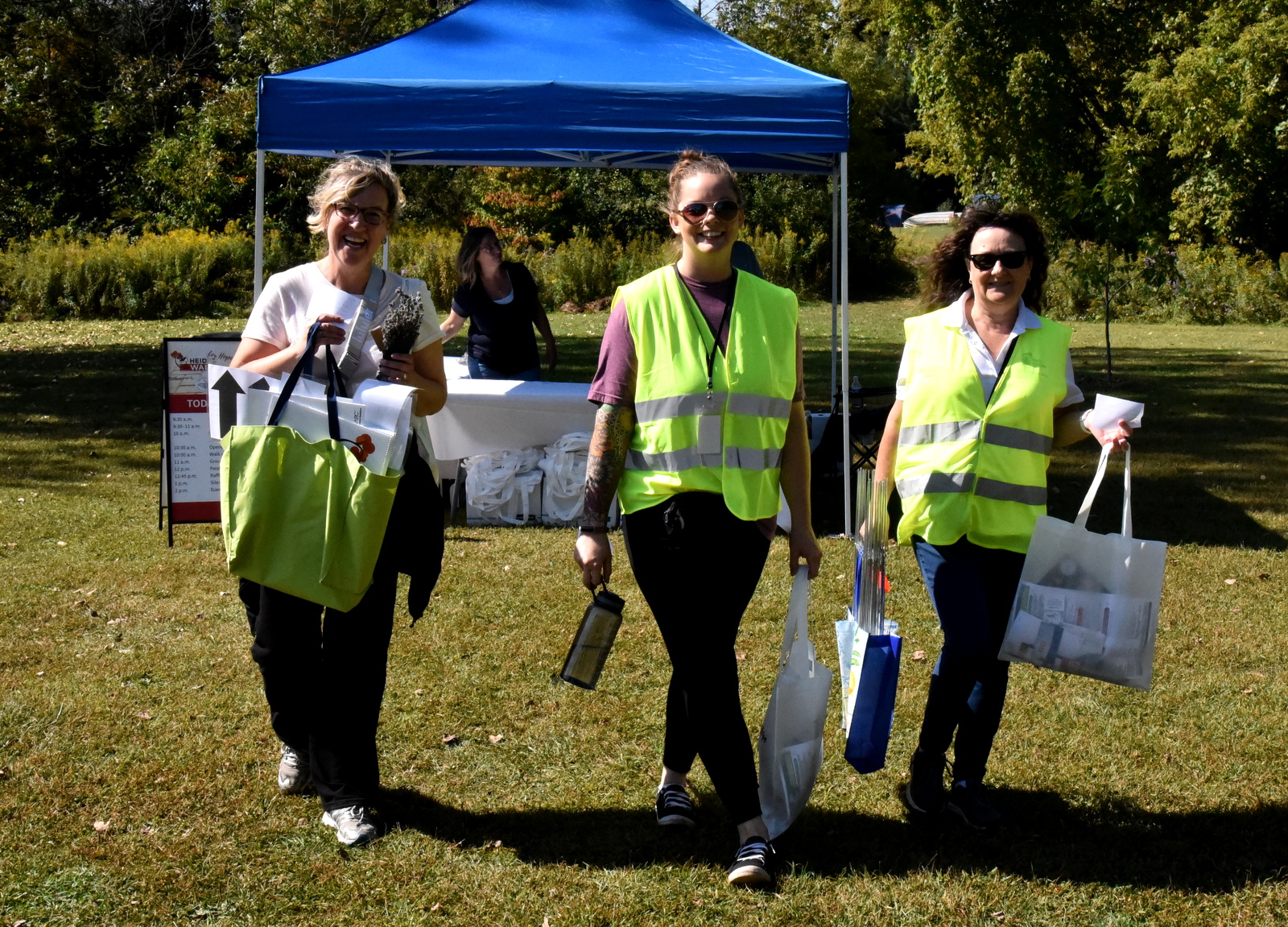 Proud volunteers collecting their swag bags after completing the 5km walk in honour of Heidi's Walk for Hope September 2023.