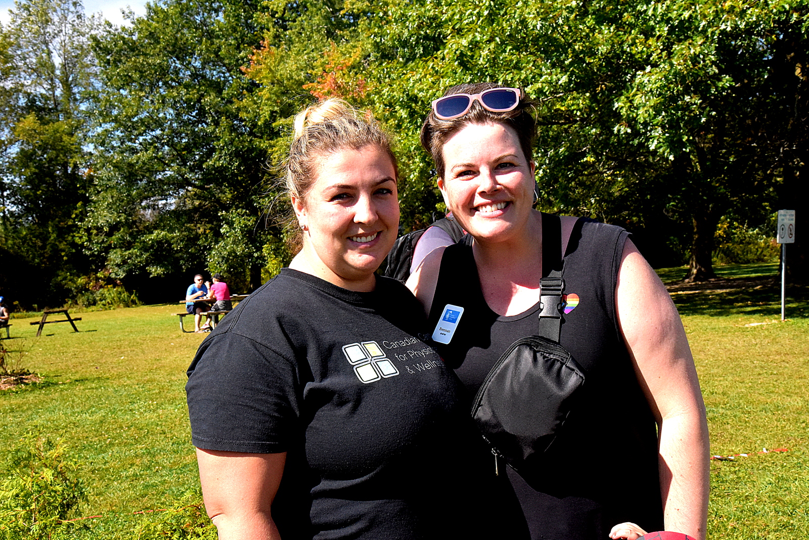 Brennan and friend from CCP Wellness smiling supporting Heidi's Walk for Hope September 2023.