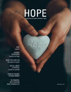 Family Transition Place's 2023 HOPE magazine cover black background with hands holding a heart-shaped rock with the word hope engraved into it.